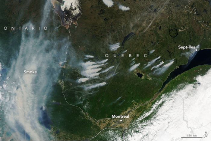 Satellite image of Quebec and Eastern Ontario from June 3, 2023, showing active fires and smoke. 